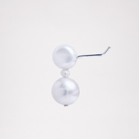 A side view of an Onomatpee Pokopoko 3-pearl stud earring, featuring two larger freshwater pearls, a small pearl in the center, and silver post. Available at NiMi Projects UK.