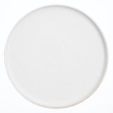 A large, round Kihon no Utsuwa white, Japanese dinner porcelain plate. Made in Japan from recycled ceramics and local clays and available at NiMi Projects UK.