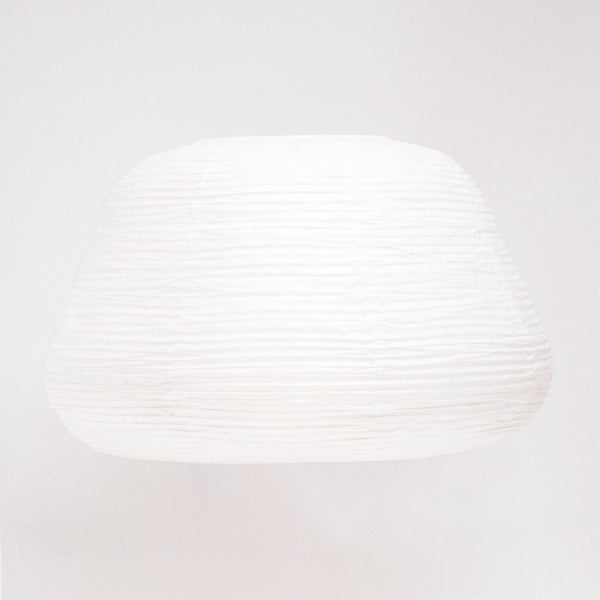 A Saiko Mochi chochin-style Lampshade available at NiMi Projects, made of washi paper and coated wire. Made in Japan.