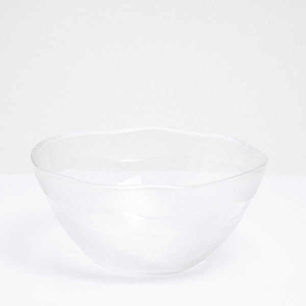 Side view of a vintage Japanese glass bowl, featuring stippled horizontal stripes on its outside and a gently waved rim. Available at NiMi Projects UK.