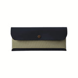 Image of a Postalco Snap Pen Case with a navy blue soft, cow-hide top with metal snap clasp and mint green cotton textile central section.